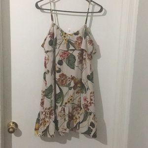Cream colored Floral print float dress.